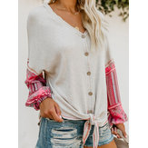 Tweekleurige truien met V-hals en stiksels