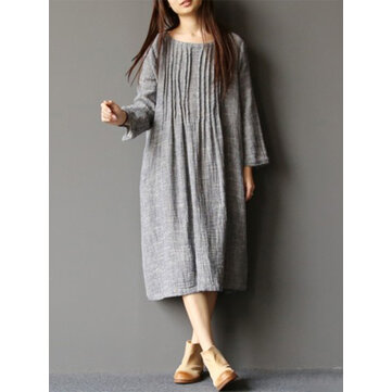 Solidna plisowana sukienka damska z dekoltem w szpic